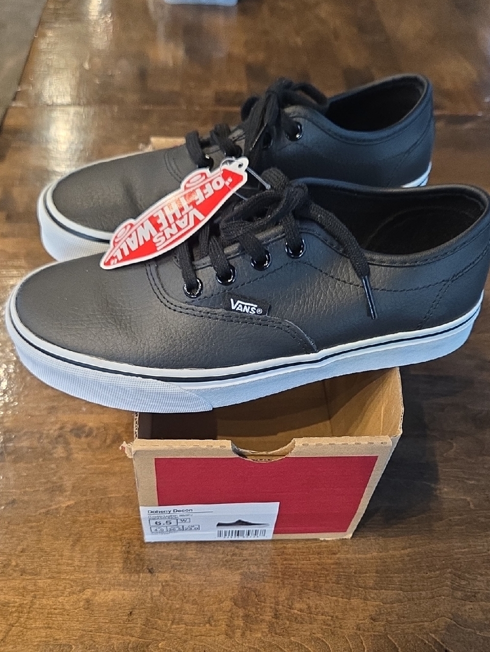 Vans Size 7 Women's Black Leather Low-Top Sneakers with White Sole